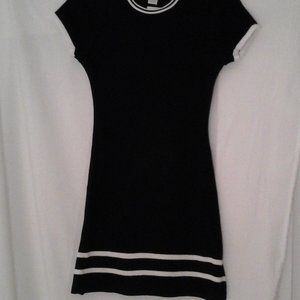 Women's black knit dress with white accent stripes